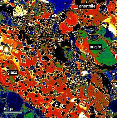 False-color BSE image showing vesiculated matrix.